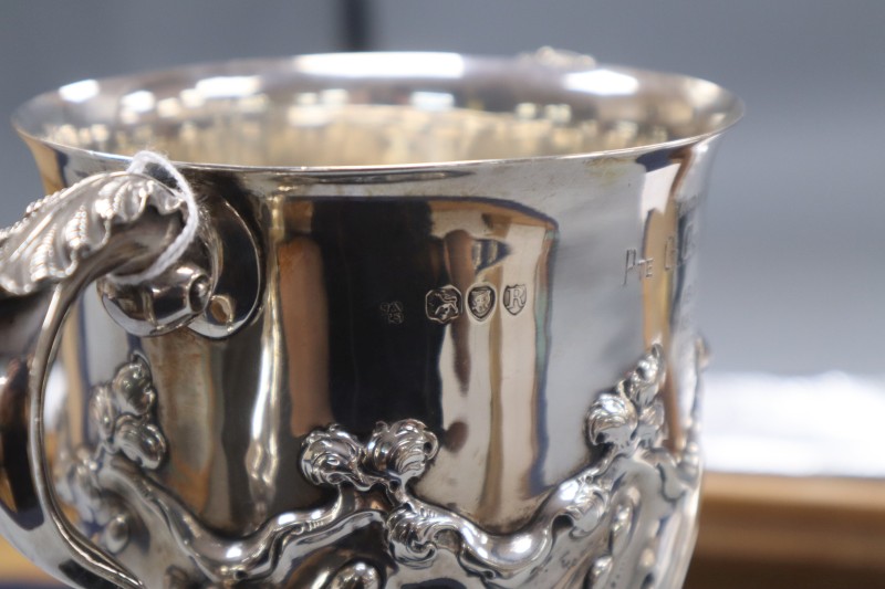 A late Victorian demi-spiral fluted silver two handled silver trophy cup, Aldwinckle & Slater, London, 1892, 13.9cm, 15.5oz.